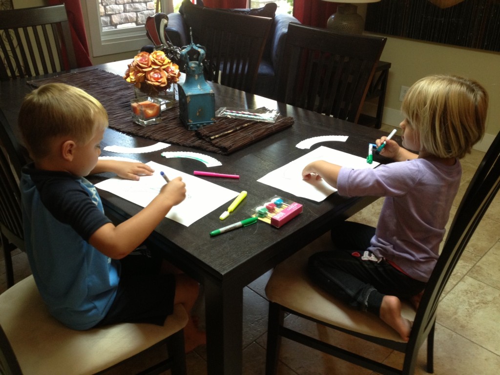 Kids decorate cupcake sleeves